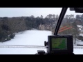 Cockpit view of landing at Bibury Court Hotel in the snow